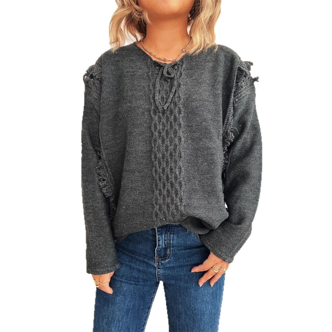 Kvinders chunky strikket sweater med afslappede frynser og dekorativ kabel-design Stilla