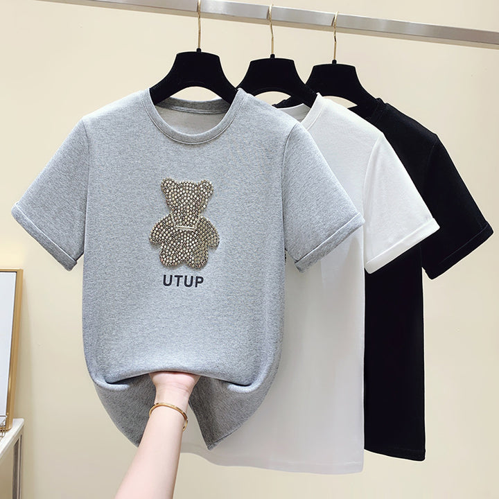 Kvinders T-shirt med funklende bjørnemotiv og afslappet pasform Stilla