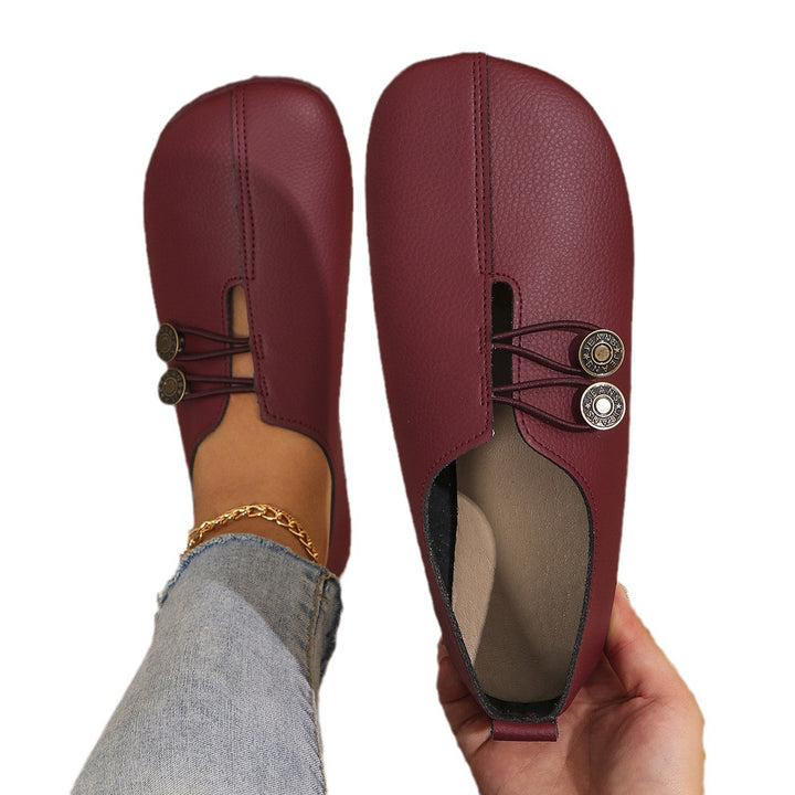 Dame Slip-On sko med moderigtigt knapdetalje og blødt overmateriale Stilla