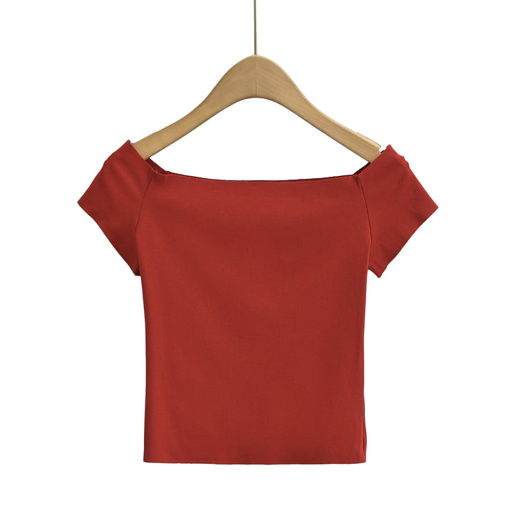 Dame top med smart off-shoulder-design og delikate puffærmer Stilla