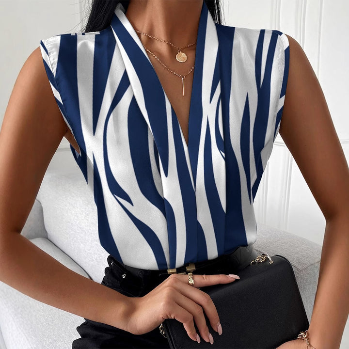 Dame modebluse i avistryk Stilla