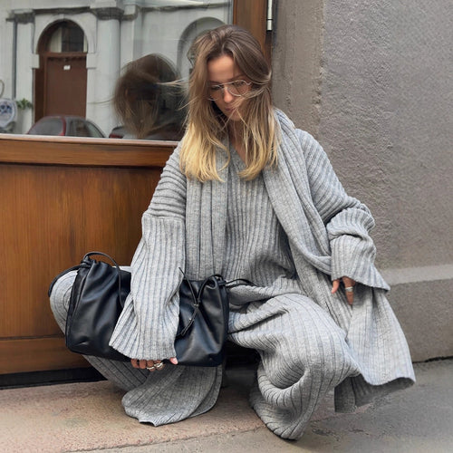 Kvinders strikdragt med en løs pasform og elegant design Stilla