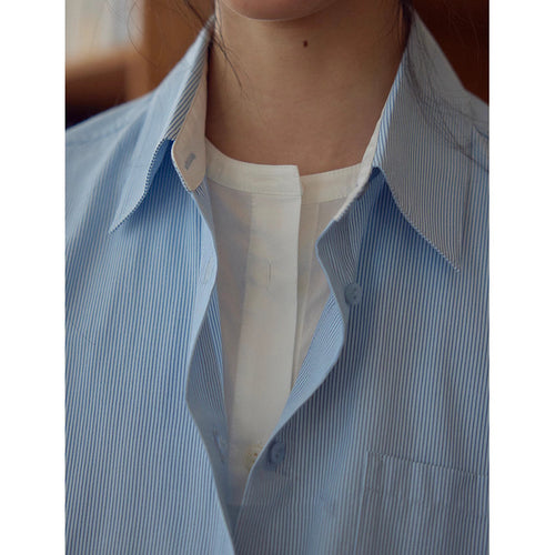 Dame oversized skjorte bluse i afslappet stil med praktiske lommer Stilla