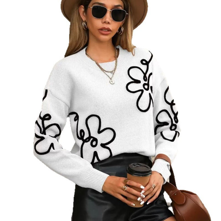 Kvindernes fashionable trøje med blomsterapplikationer Stilla