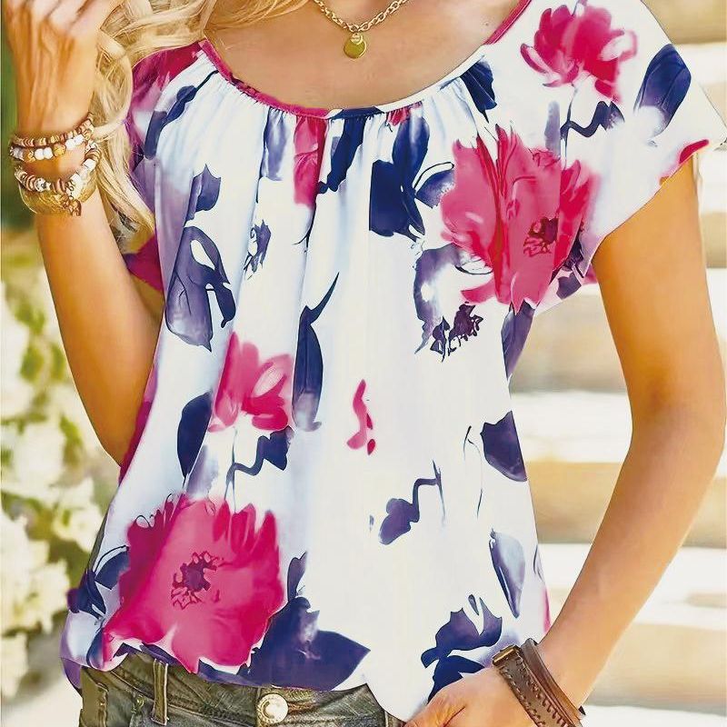 Damebluse med blomsterdesign og bred pasform Stilla