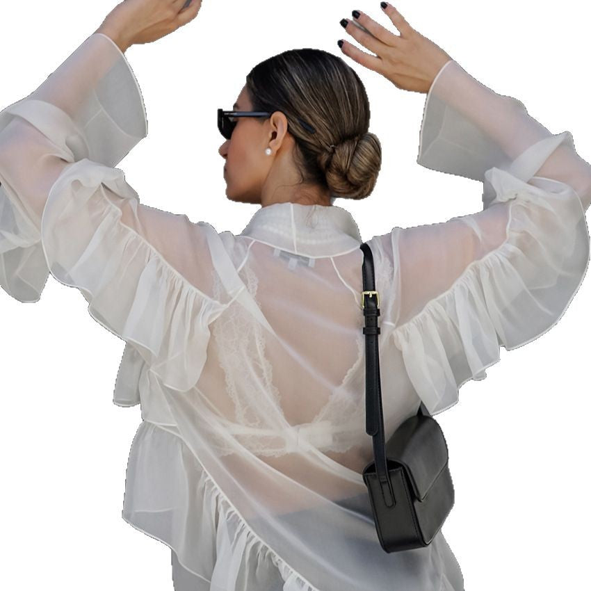 Dame Transparent Rynkebluse med voluminøse ærmer og elegant design Stilla