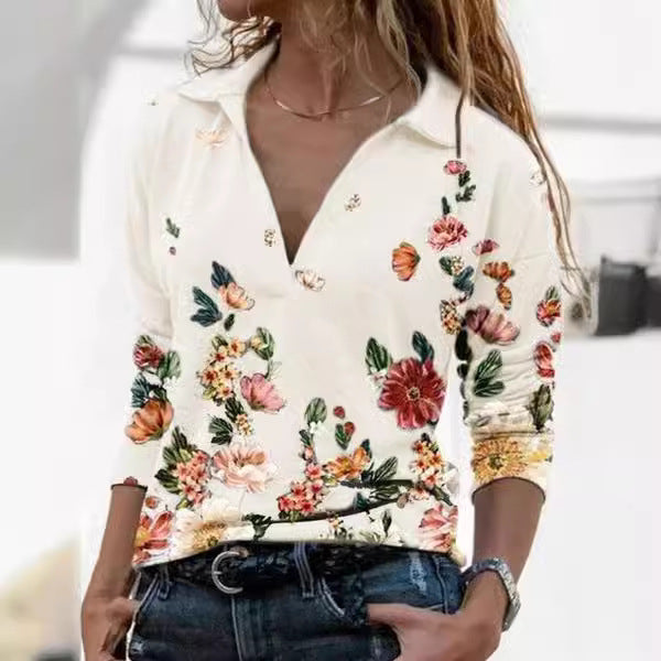 Damebluse med blomsterdesign og polo-krave Stilla