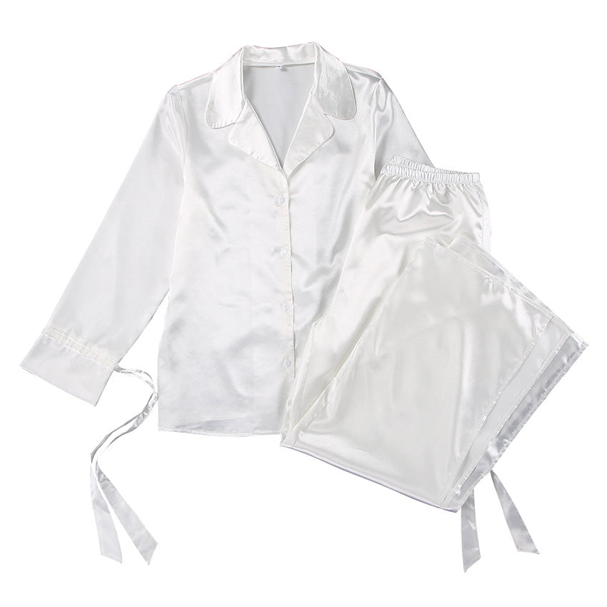 Dame Satin Pyjamas Sæt med elegant knaplukning og løstsiddende bukser Stilla
