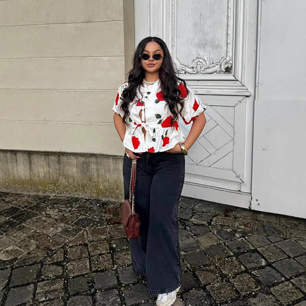 Damebluse med blomsterprint og knudedetalje Stilla