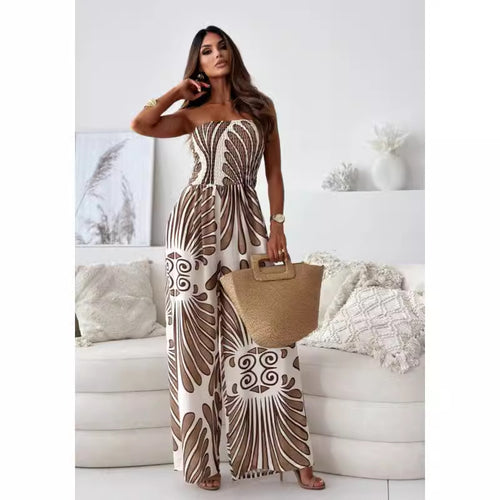 Damer bredskåret jumpsuit med stropløs design og elegant mønster Stilla