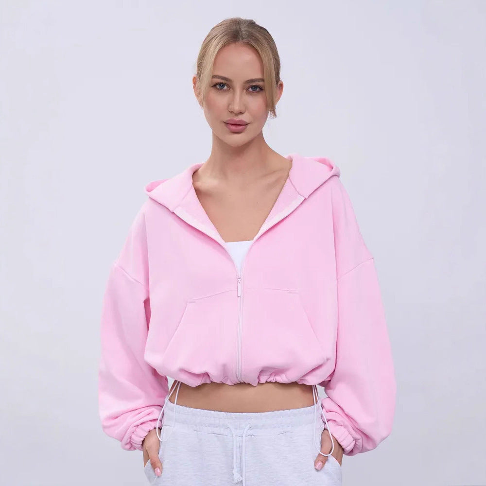 Dame cropped hoodie jakke med voluminøse ærmer og praktiske lommer Skovae
