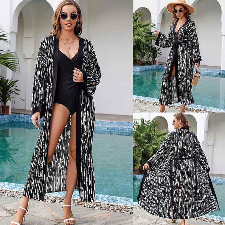 Dame elegant strandkimono med raffineret palmemønster og taljerbar bælte Stilla