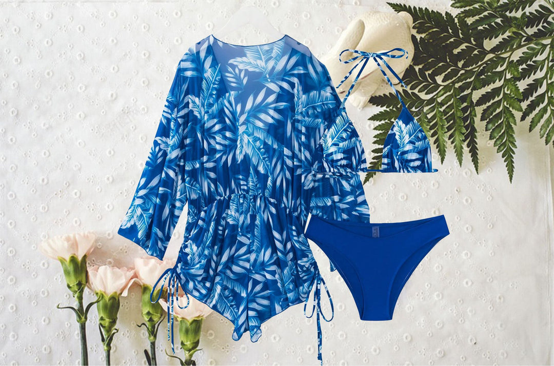 Dame swimsuit with elegant V-neckline and playful palm print Skovae