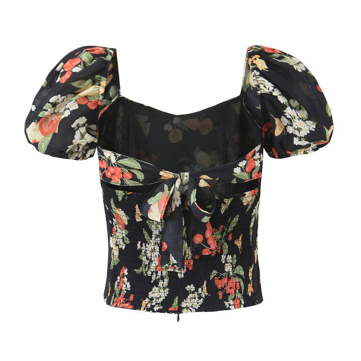 Dame Blusenshirt med luftige pufærmer og blomsterdesign Stilla