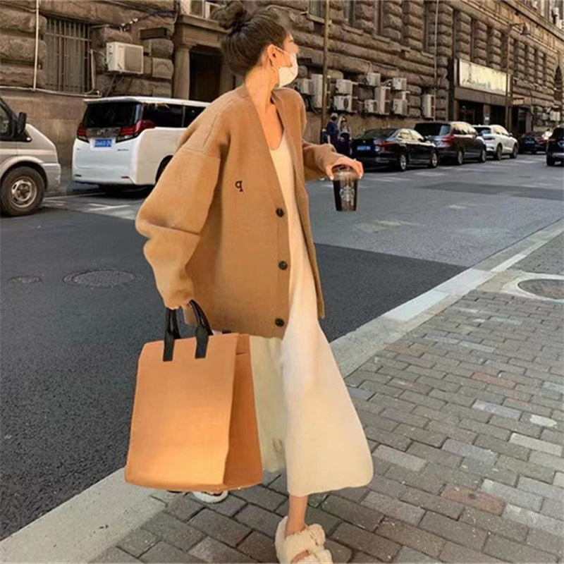 Kvinders oversized cardigan med stilfuld krave og praktiske lommer Stilla
