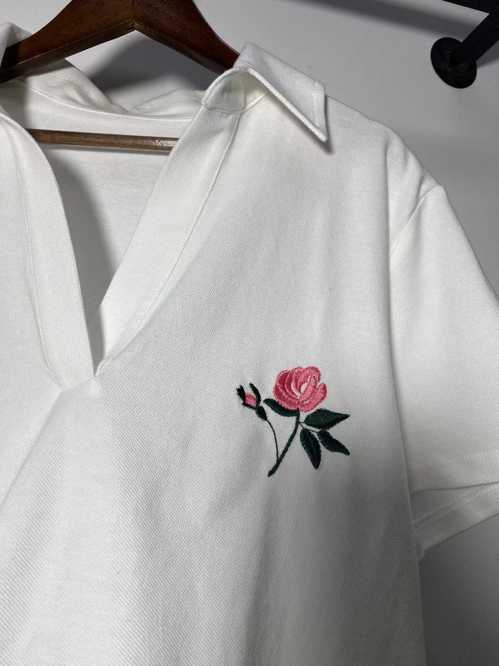 Dame polo T-shirt med blomster broderi Stilla