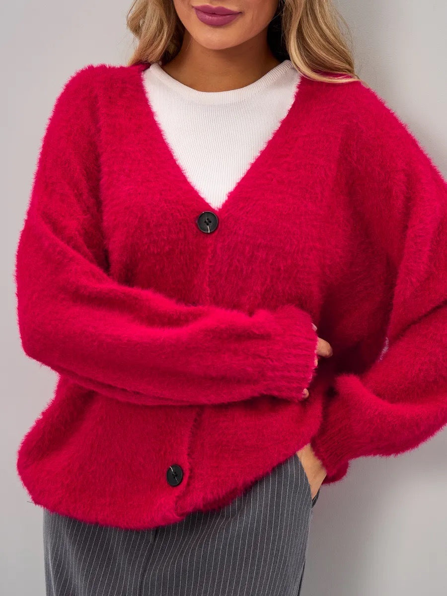 Kvinders hyggelige cardigan med asymmetrisk snit og knaplukning Stilla