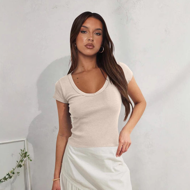 Dame tætsiddende Crop-Top med V-hals og elastisk ribstruktur Stilla