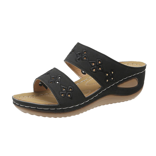 Dame Wedge-Pantoletten med floralt cut-out-design og ergonomisk sål Stilla