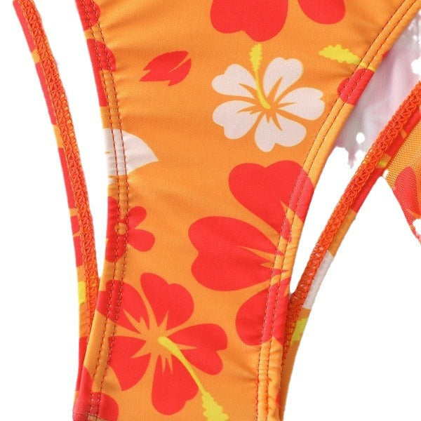 Dame bikini-sæt med blomsterdesign og smart indpakningsskørt Stilla