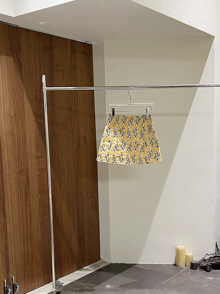 Dame Trendy XS Midi-Nederdel med blomstermønster og flydende snit Stilla