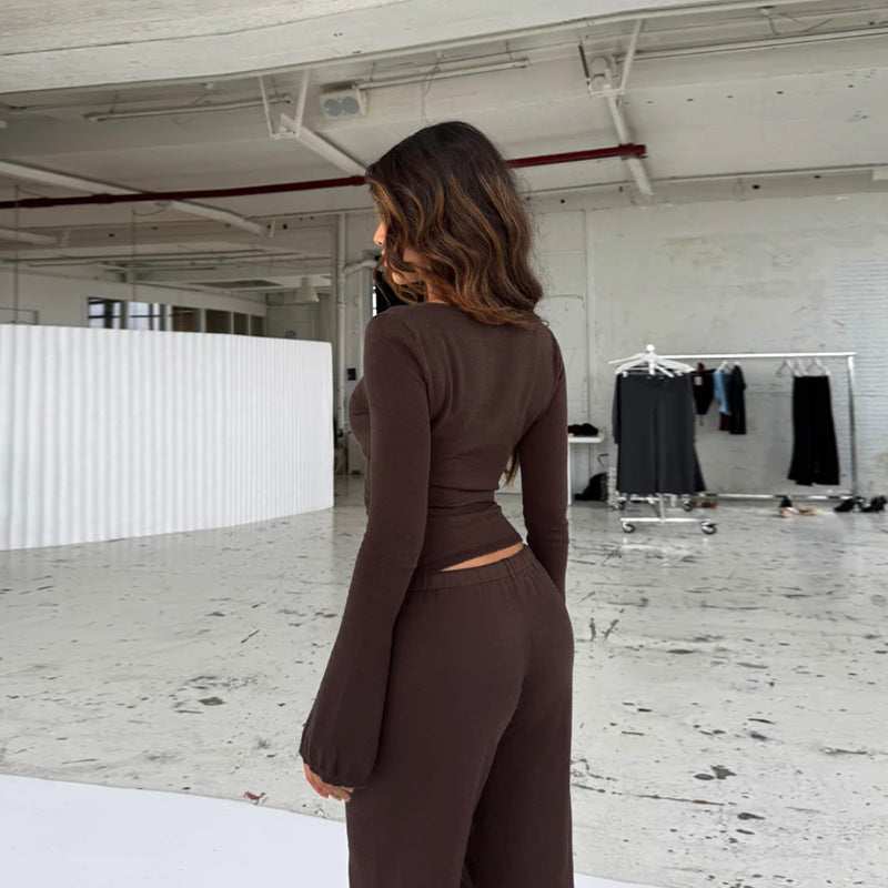 Damer løs jumpsuit med omslag design og lange ærmer Skovae