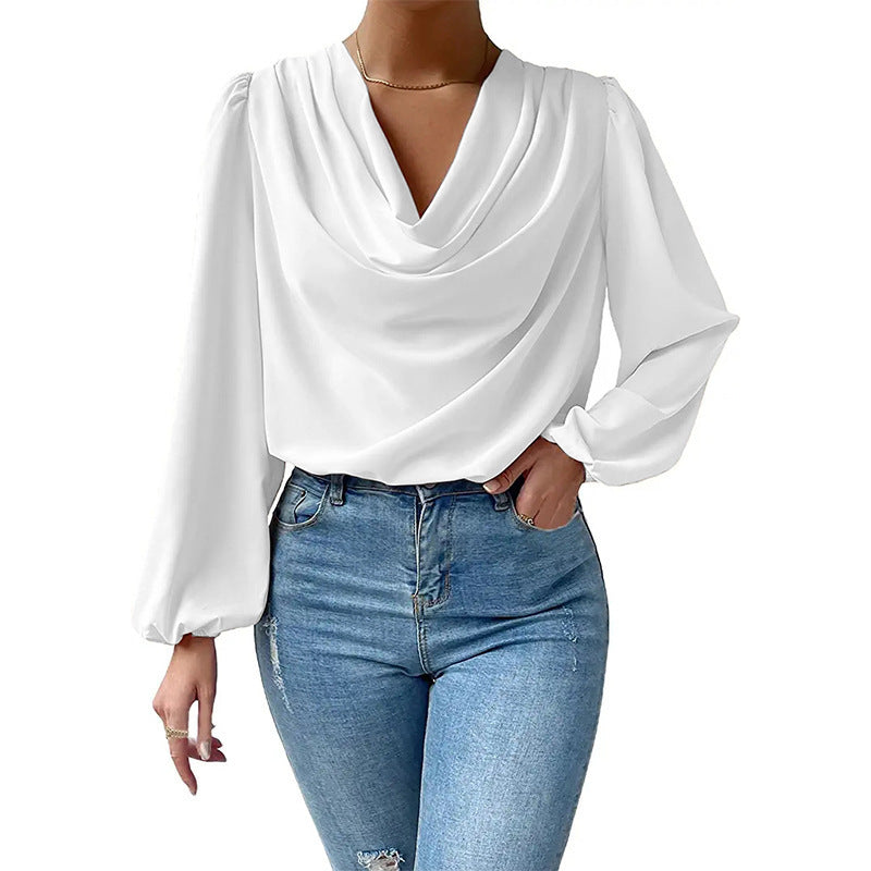 Damebluse med elegant drapering Stilla