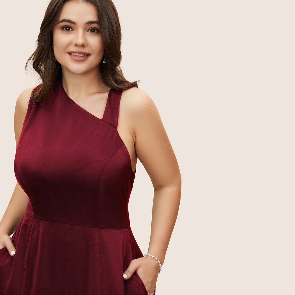 Dame elegant maxikjole med asymmetrisk neckholder og sidelommer Stilla