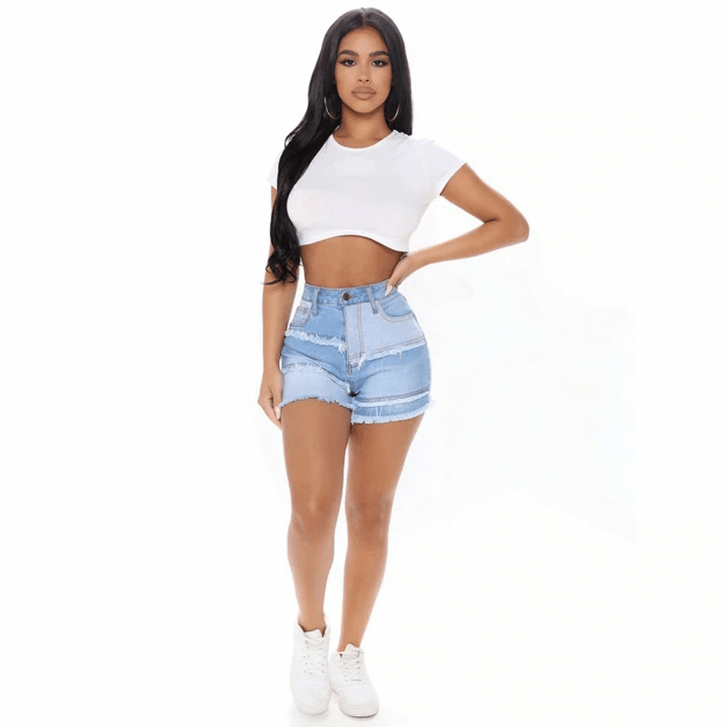 Dame Jeans-Shorts i kreativ patchwork-design med frynset kanter Stilla