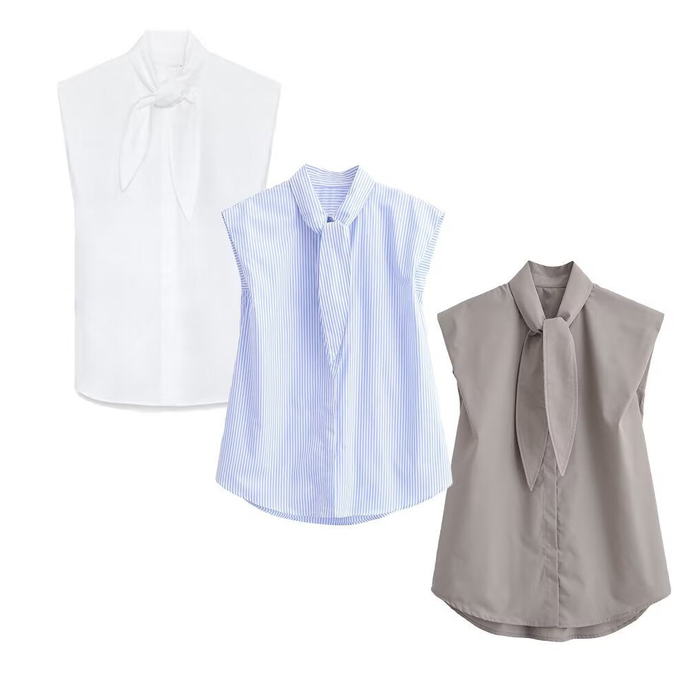 Damebluse med innovativ stående krave og elegant sløjfeapplikation Skovae