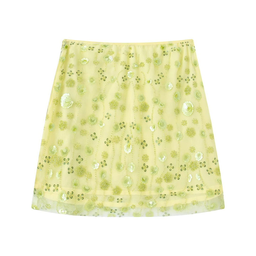 Dame mini skirt med glitrende palietter og blomstret design Skovae