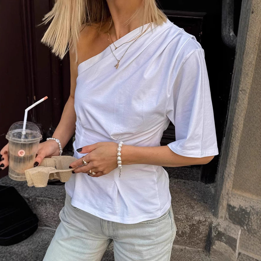 Damer asymmetrisk top med en one-shoulder design og voluminøs kant Stilla