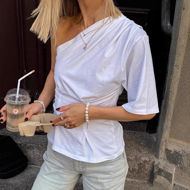 Damer asymmetrisk top med en one-shoulder design og voluminøs kant Stilla