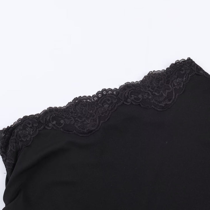 Dame asymmetrisk spidsetop med elegante flæsedetaljer Skovae