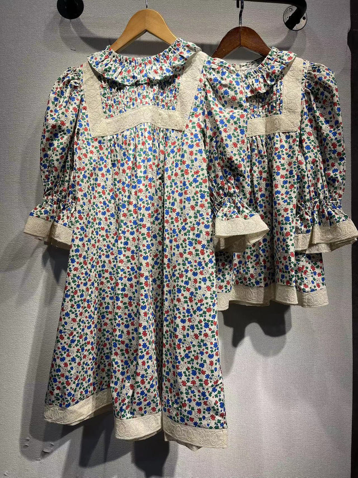 Damebluse med blomsterdesign og spidsdetaljer Stilla