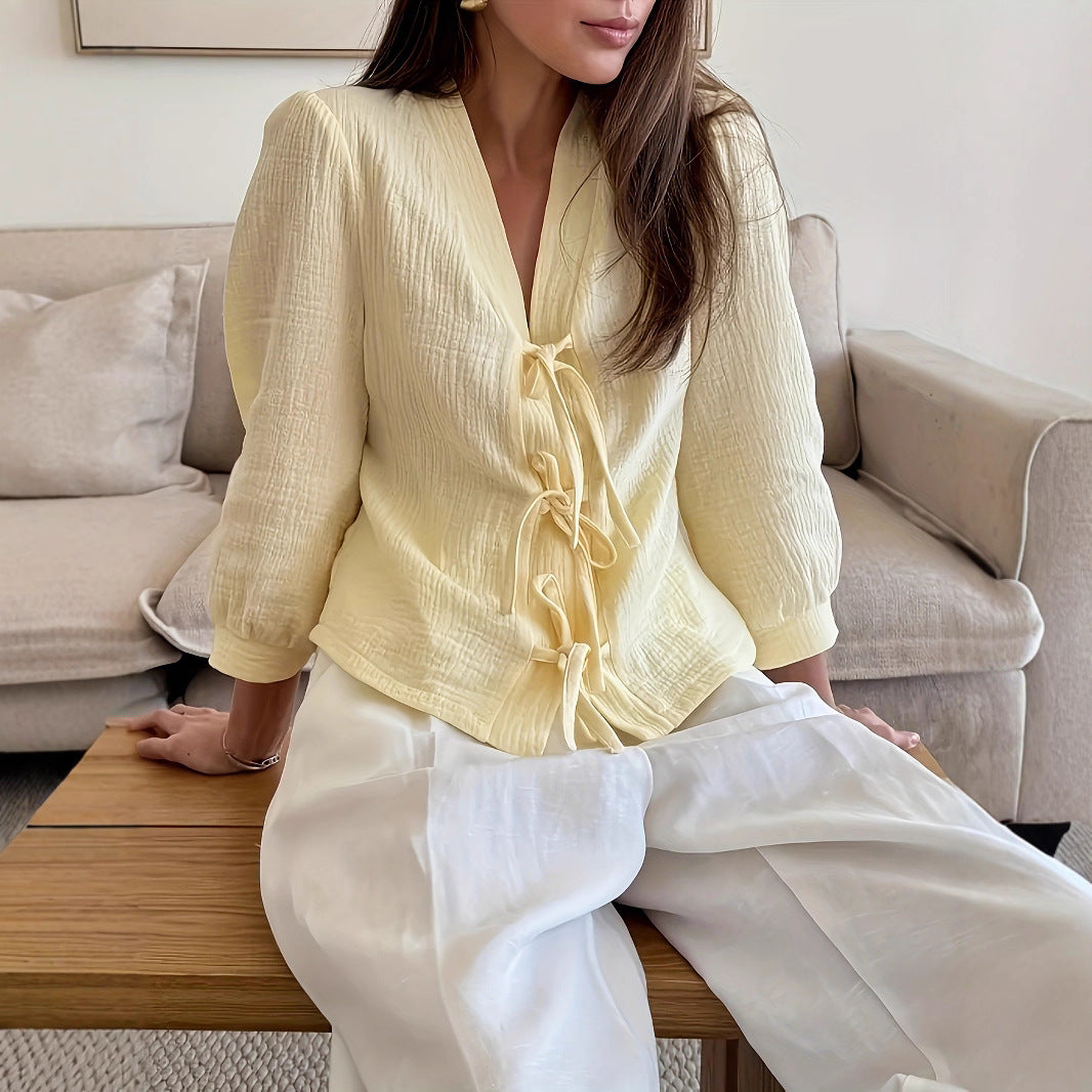 Dame stilfuld bluse med bindingsbånd og struktureret design Stilla