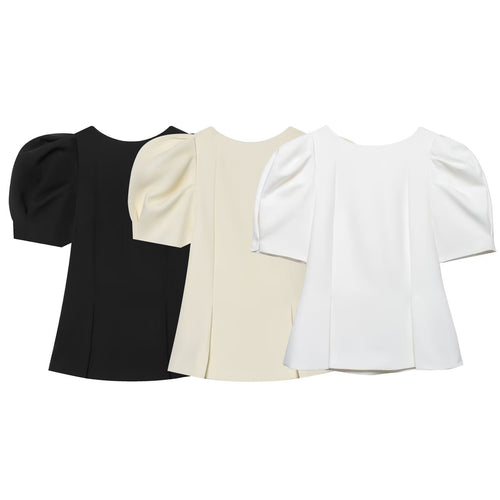 Damebluse med puffærmer og elegant snit Skovae