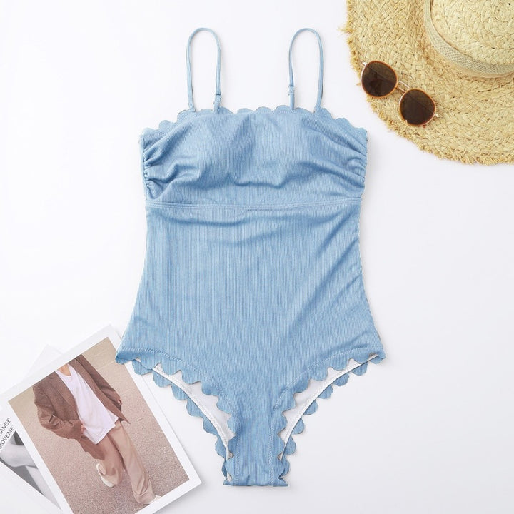 Dame eni-delt badeanzug med feminine ruffle detaljer og justerbare stropper Skovae