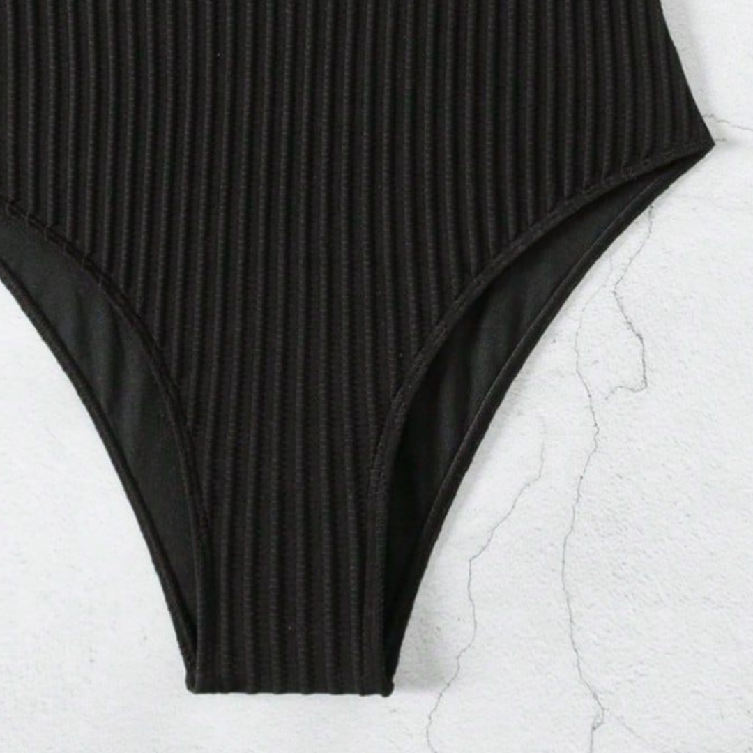 Dame Cut-Out Badedragt med elegant ribbet design Skovae
