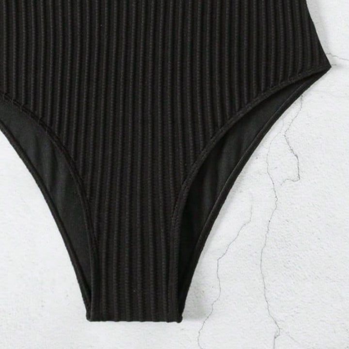 Dame Cut-Out Badedragt med elegant ribbet design Skovae