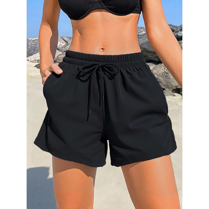 Dame Sportslige Badshorts med elastisk talje og praktiske lommer Skovae