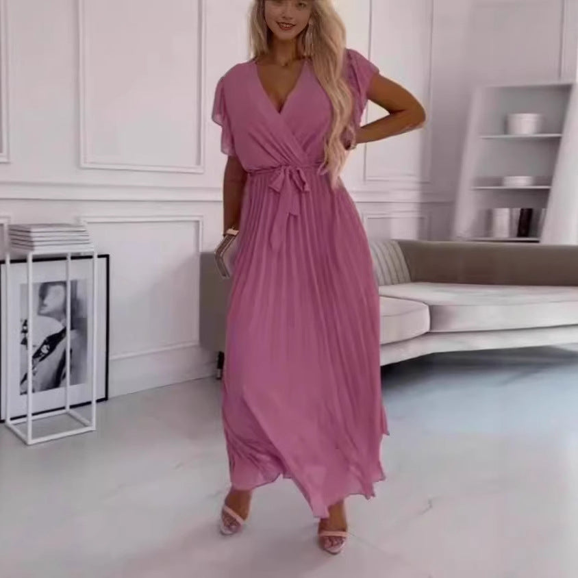 Dame maxikjole med elegant omslagsdesign og svajende flæserkirtel Stilla