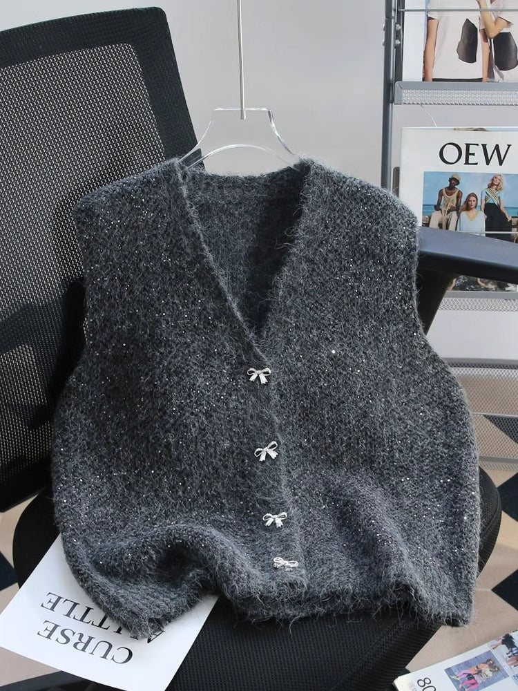 Dame strikket vest med glitrende accenter og dekorative knapper Stilla