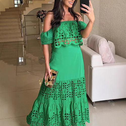Dame Maxi-nederdel med raffineret cut-out-design og voluminøs kant Stilla