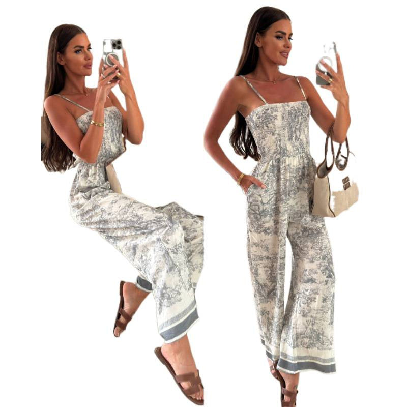 Dame jumpsuit med legende blomsterdesign og luftig pasform Skovae