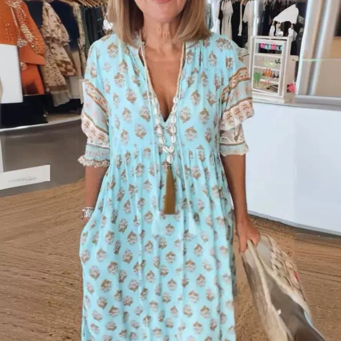 Dame Maxikjole med floralprint og stilfulde knapdetaljer Stilla