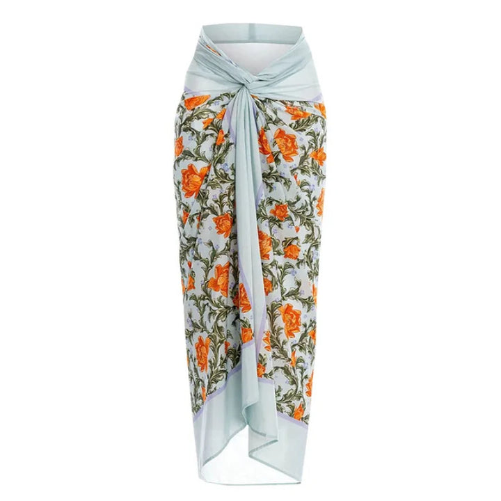 Dame svømmedragt med blomstret design og raffineret cut-out-look Skovae