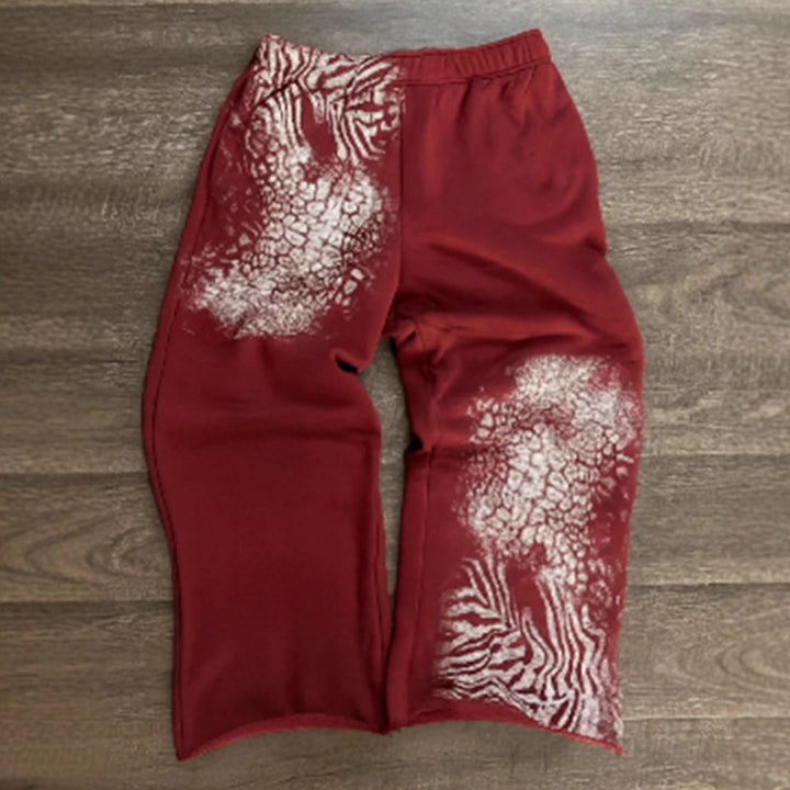 Dame nan løse sweatpants med asymmetrisk dyreprint, elastisk komfortlinning og lige ben Skovae