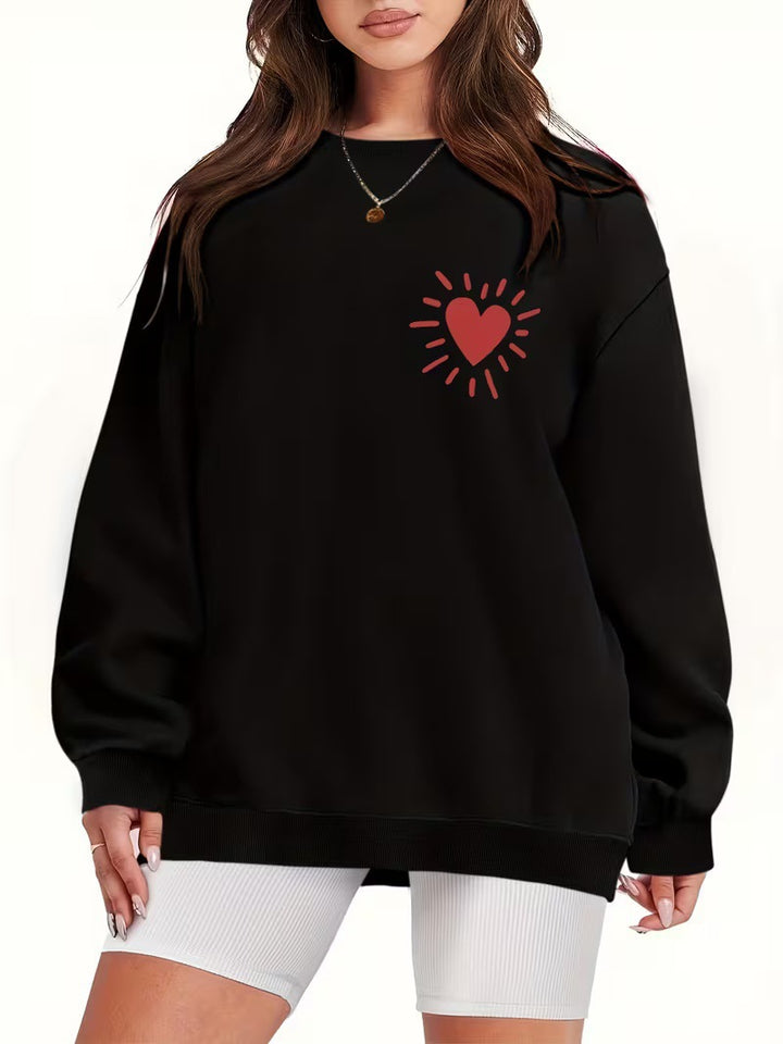 Kvinders sweatshirt med afslappet hjertemotiv og oversized pasform Skovae