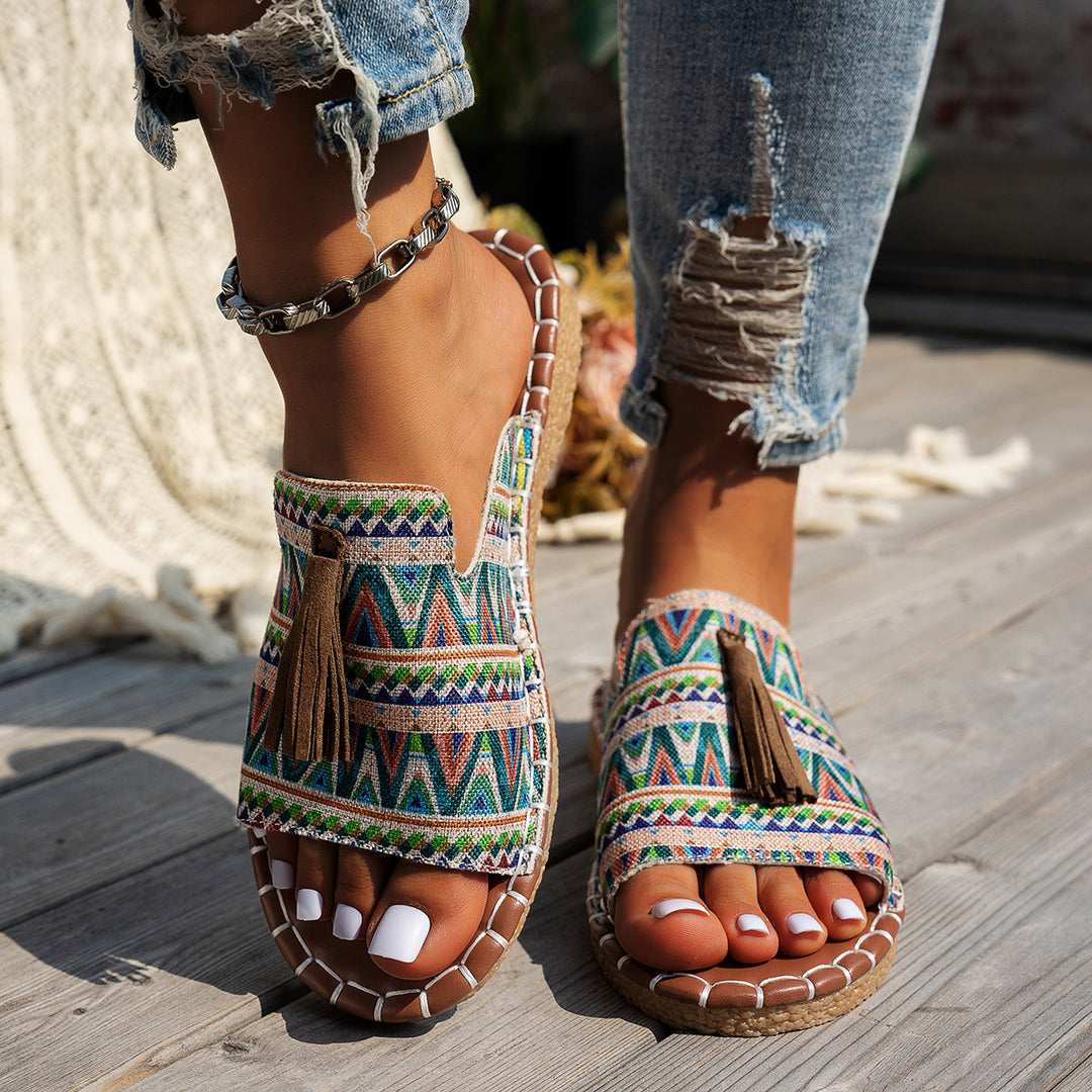 Dame slide-sandaler med farverigt vævdesign og fashionable kvaster Stilla